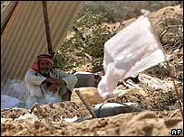 Man sits in the rubble in Gaza