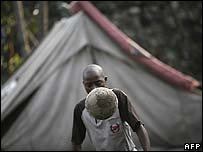A boy kicks a ball in DR Congo