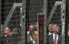 andrew-meares-howard-and-bush-behind-the-cage.jpg